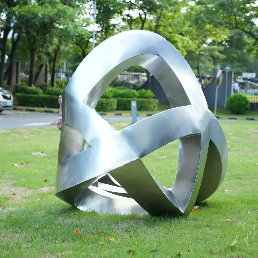 Stainless steel abstract ribbon-wrapped sculpture