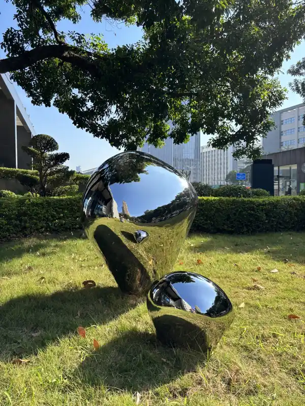 Mirror-Polished Stainless Steel Stone Sculpture