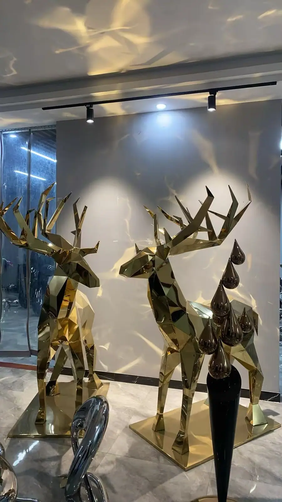 Golden Geometric Deer Sculptures