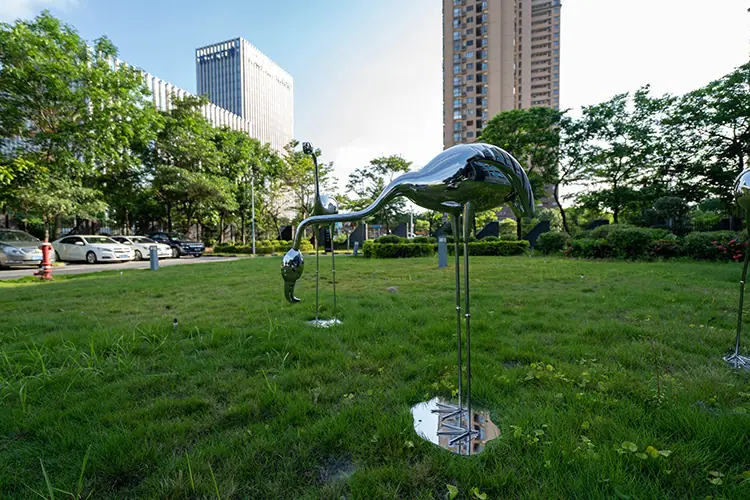 Stainless steel bird sculpture.