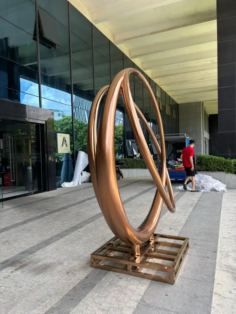 2.5-metre electroplated gold circular ring sculpture (2)