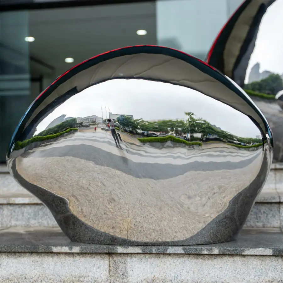 Stainless steel high gloss stone sculpture. Explore unlimited creative possibilities, we are a professional stainless steel sculpture customization factory.