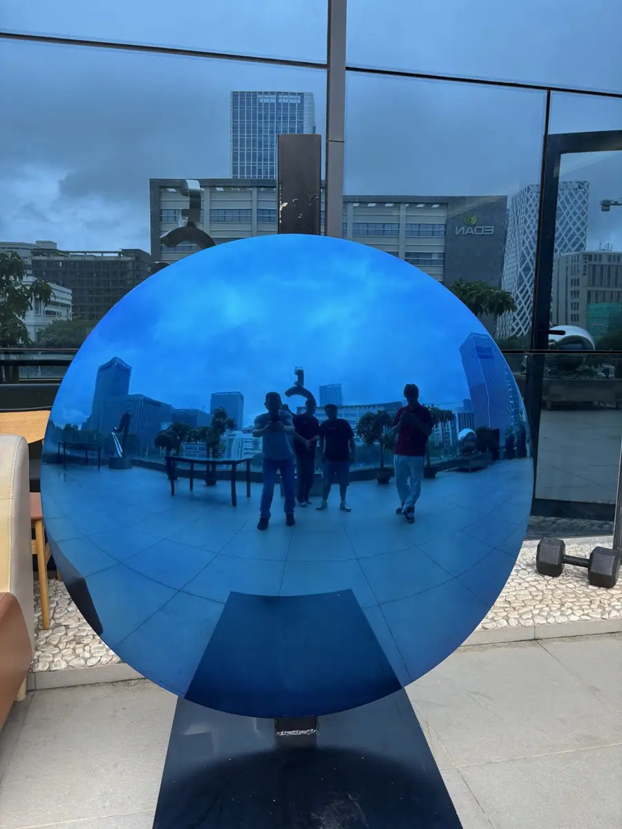 mirrored blue sculpture