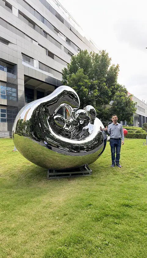 Mother Swan with Baby Sculpture