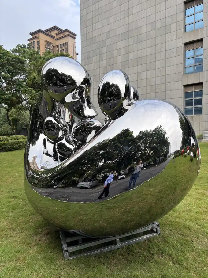 Mother Swan with Baby Sculpture