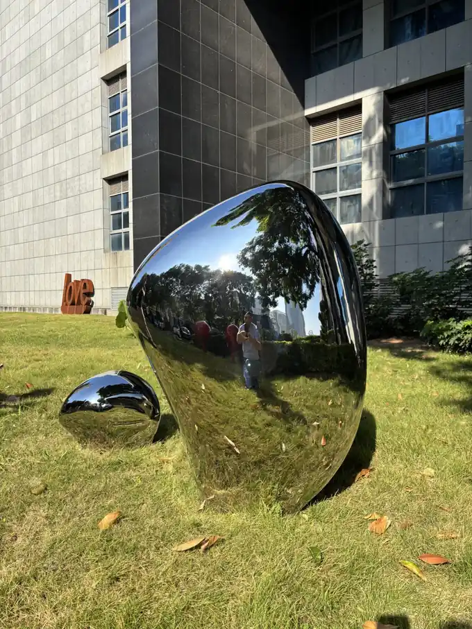 Mirror-Polished Stainless Steel Stone Sculpture