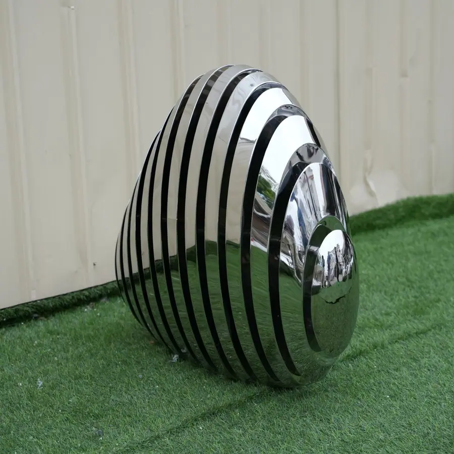 Stainless steel flake stone sculpture. Explore unlimited creative possibilities, we are a professional stainless steel sculpture customization factory. Creating unique, personalized sculptural art is our specialty. From concept to reality, we use skilled craftsmanship and exquisite craftsmanship to infuse inspiration and beauty into your space.