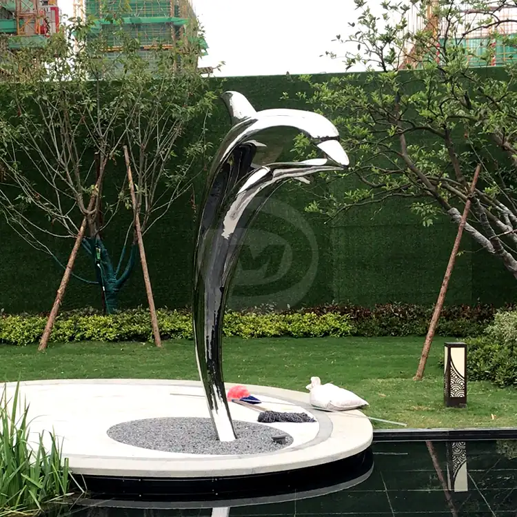 Stainless steel dolphin sculpture: a symbol of love