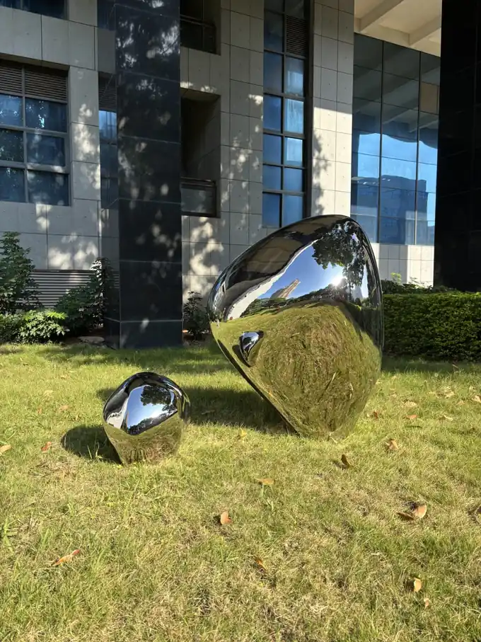 Mirror-Polished Stainless Steel Stone Sculpture