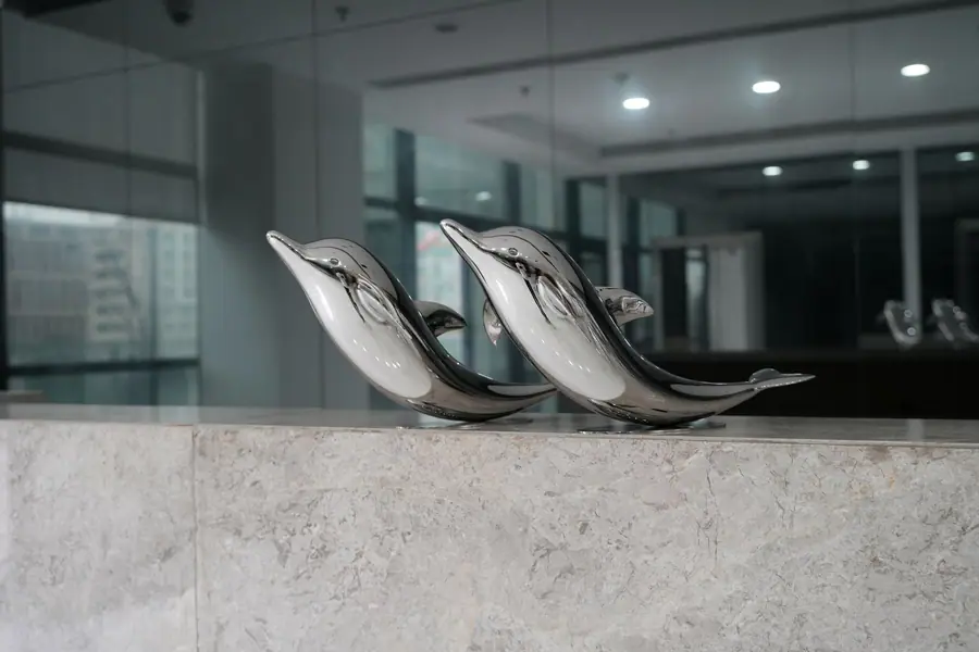 stainless steel dolphin sculpture