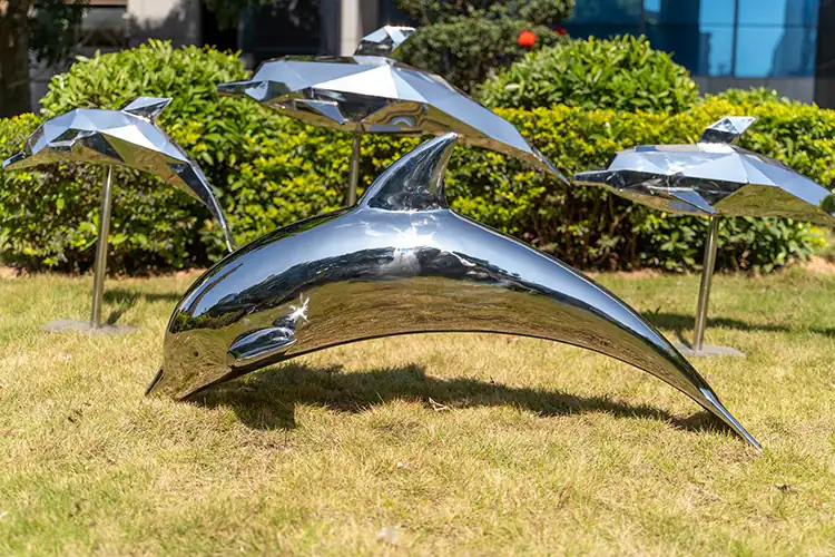 Stainless steel dolphin sculpture: a symbol of love