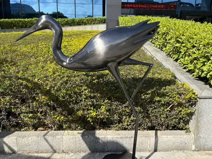 metal crane sculpture