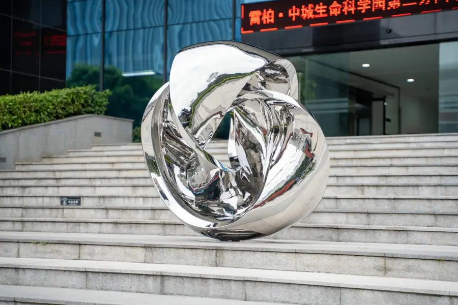 Stainless steel abstract ribbon sculpture