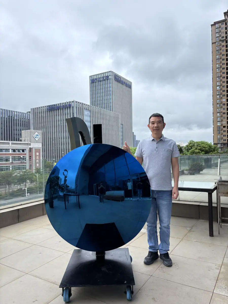 mirrored blue sculpture