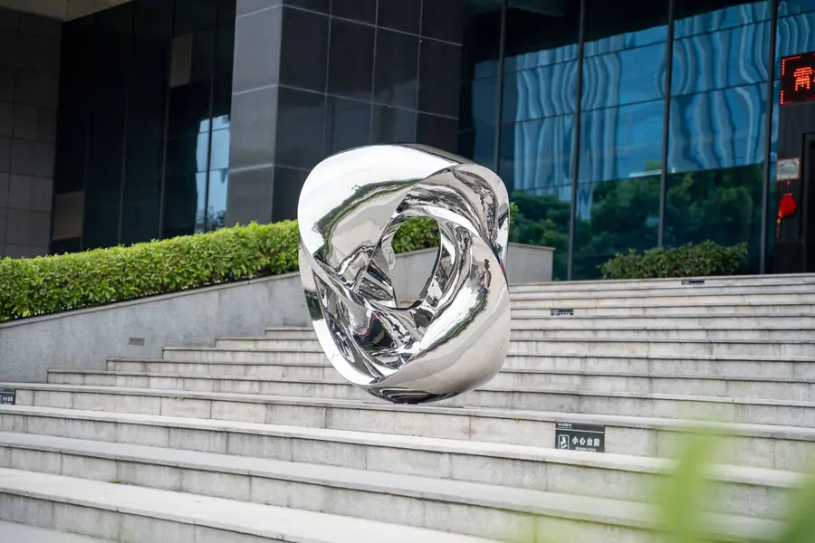 Stainless steel abstract ribbon sculpture