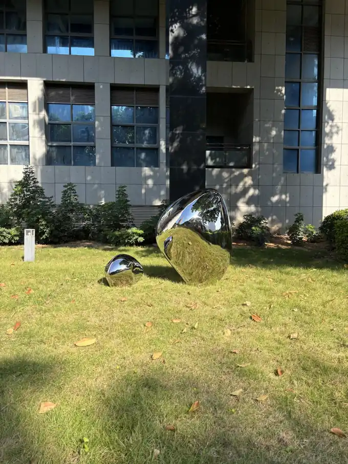 Mirror-Polished Stainless Steel Stone Sculpture