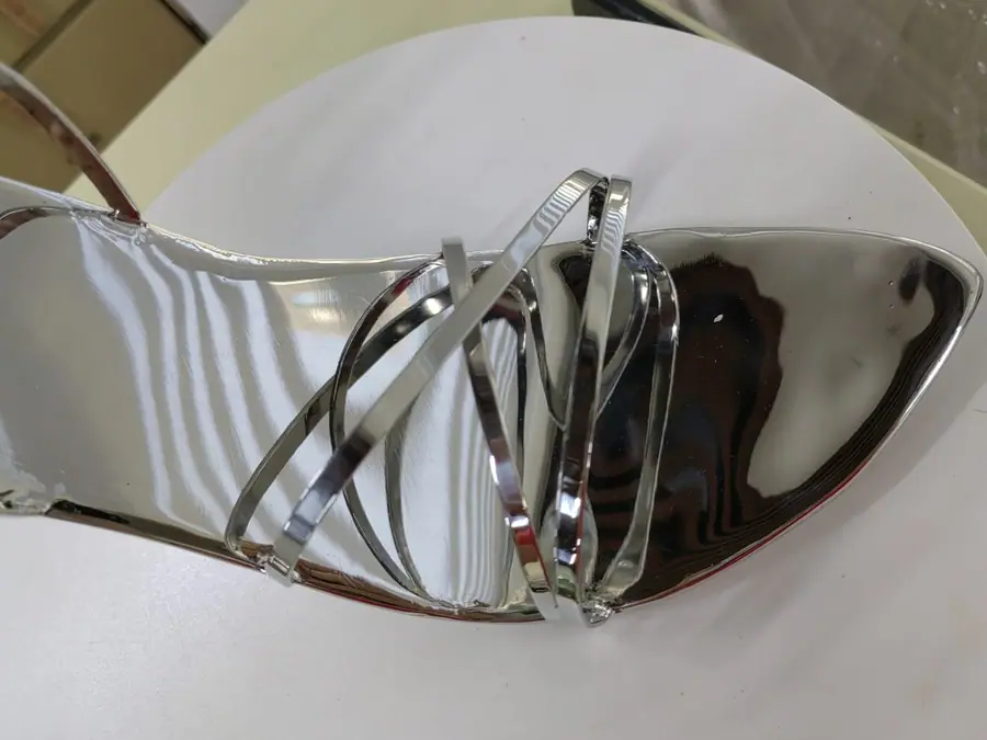 Stainless steel high heel art sculpture