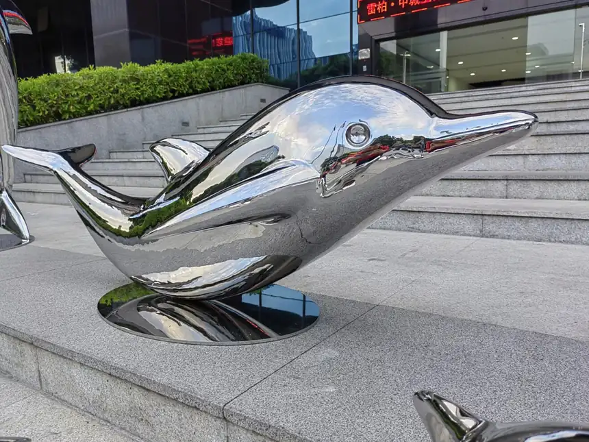 The Enchanting Beauty of Metal Dolphin Sculptures