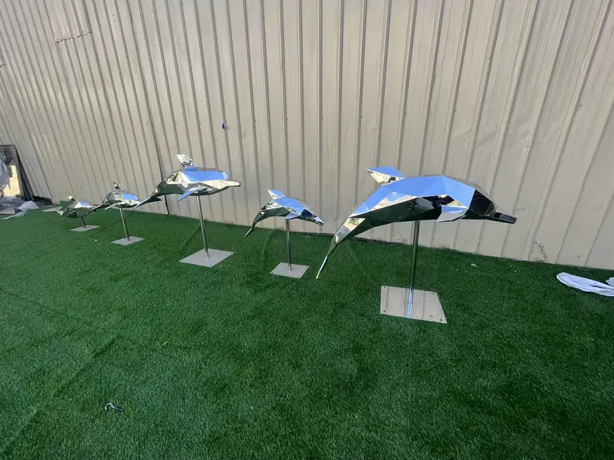 stainless steel dolphin sculpture