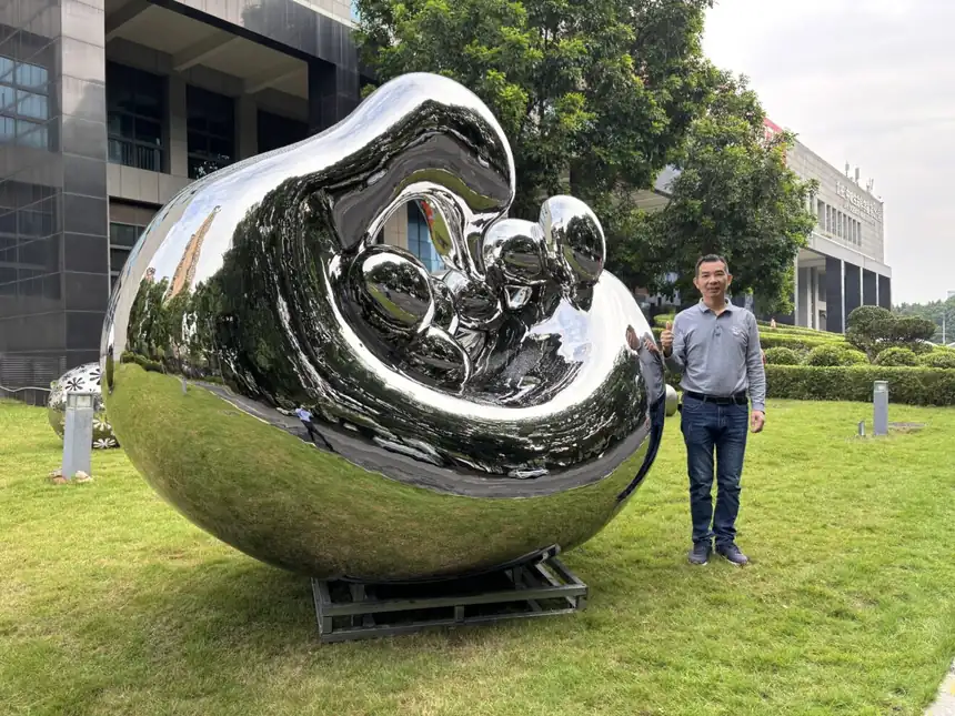 Mother Swan with Baby Sculpture