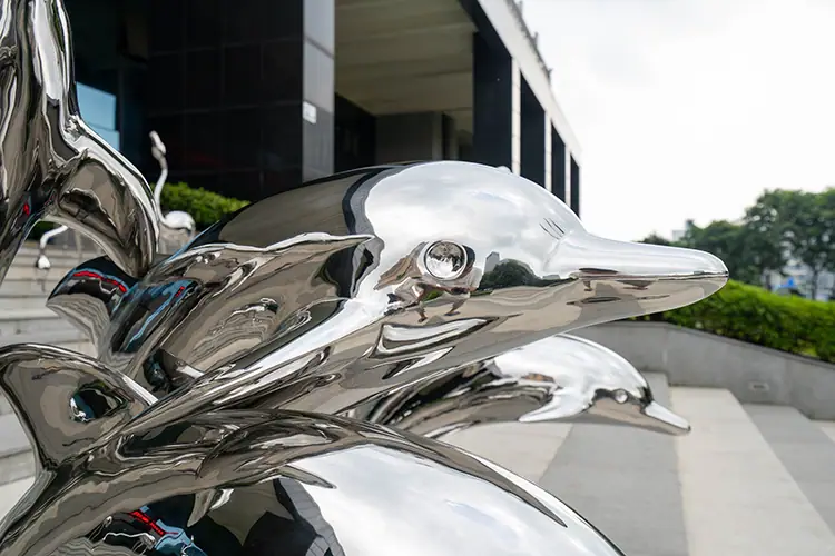 Stainless steel dolphin sculpture