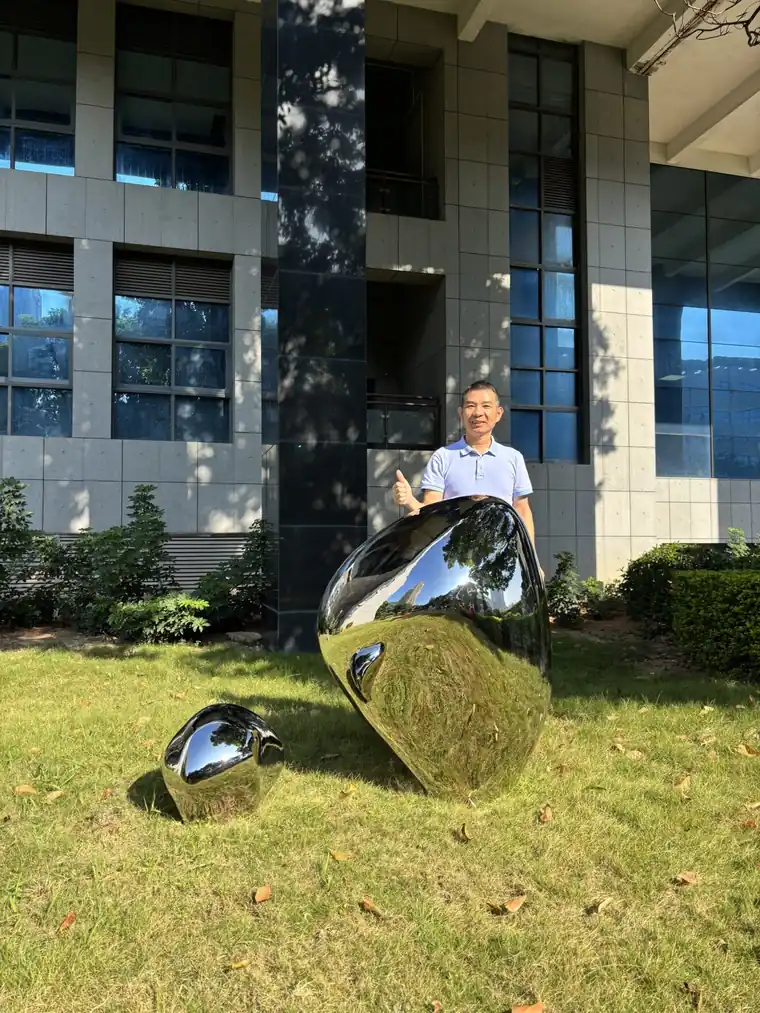 Mirror-Polished Stainless Steel Stone Sculpture