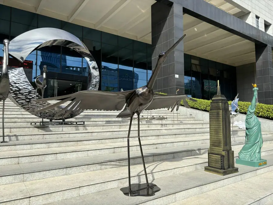 metal crane sculpture