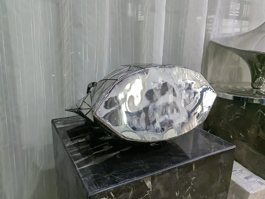 Stainless steel tote bag sculpture