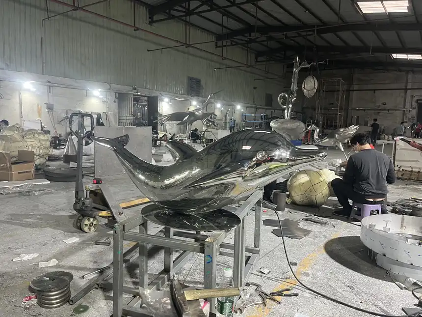 dolphin sculptures