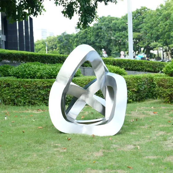 Stainless steel abstract ribbon-wrapped sculpture