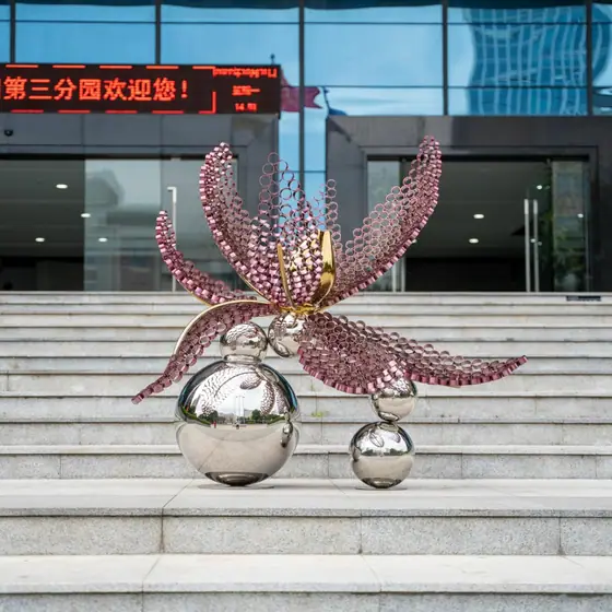 Outdoor abstract sculpture art: the harmonious dance of flowers and balls