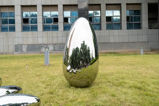 Stainless steel egg-shaped sculpture
