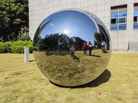 Exploring the beauty of craftsmanship in making large outdoor stainless steel spheres
