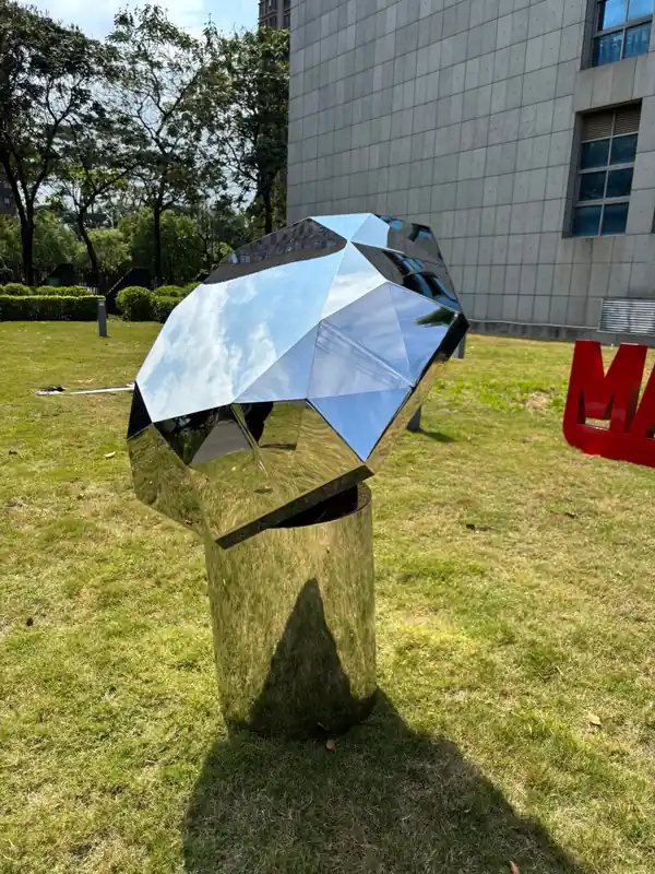 Mirror of Eternity: Diamond Sculpture in Polished Metal