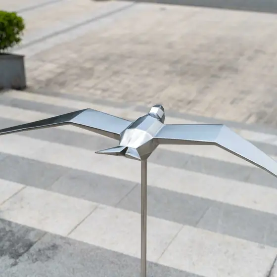 Stainless steel bird sculpture