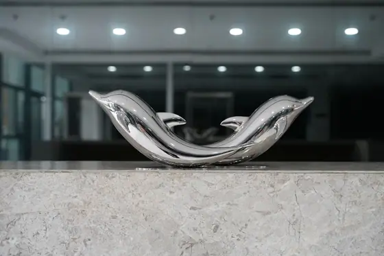 stainless steel dolphin sculpture