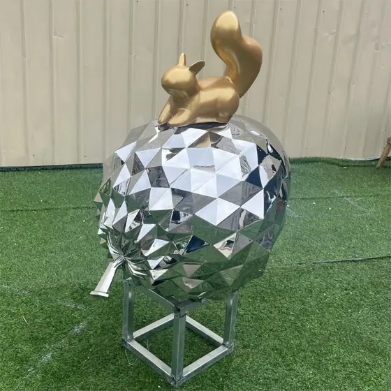Stainless steel pine cone sculpture