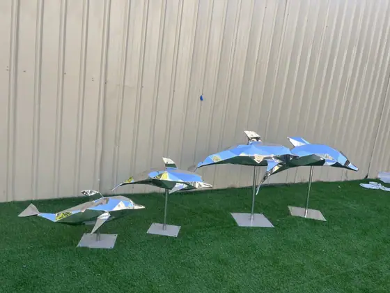 stainless steel dolphin sculpture