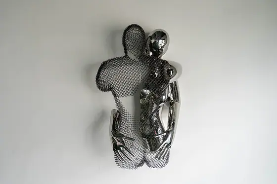 Stainless steel hollow hugging sculpture