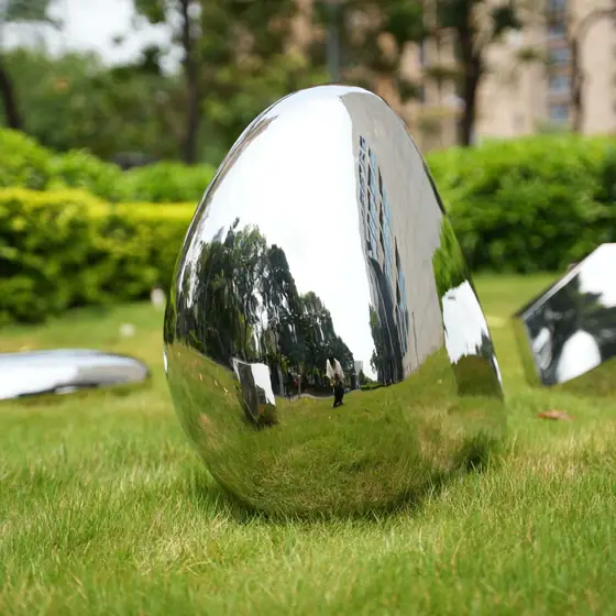 Outdoor stainless steel stone sculpture