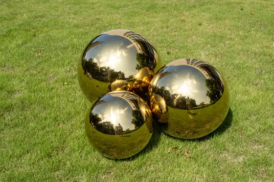 Golden Radiance: Stainless Steel Gold-Plated Spherical Sculpture