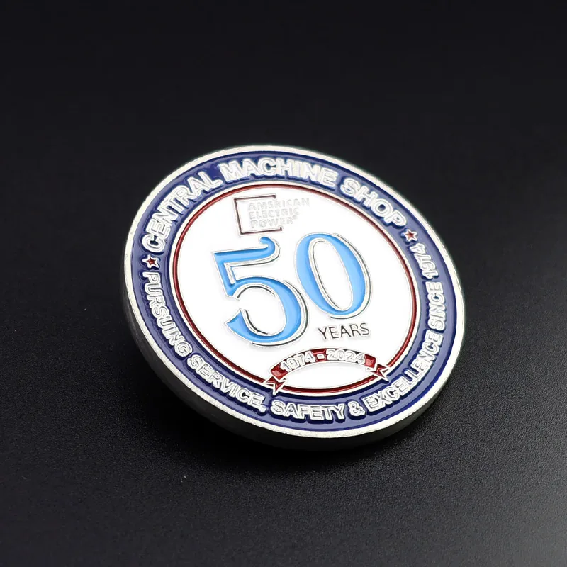 Custom gold 50th anniversary challenge coin with red white and blue enamel and polished finish