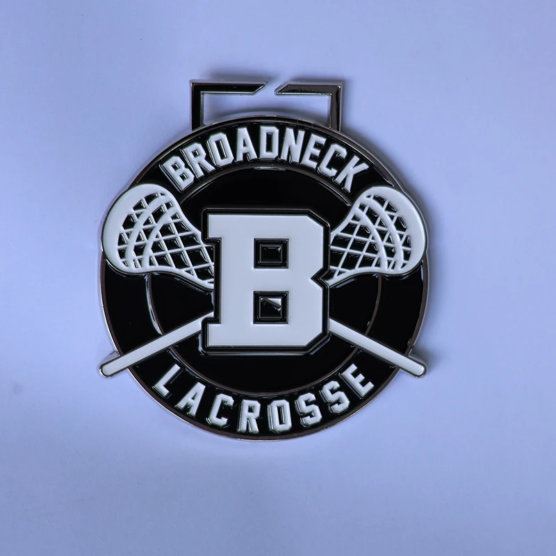 Custom black and white enamel Broadneck Lacrosse medal with crossed sticks and "B" logo on polished metal edges