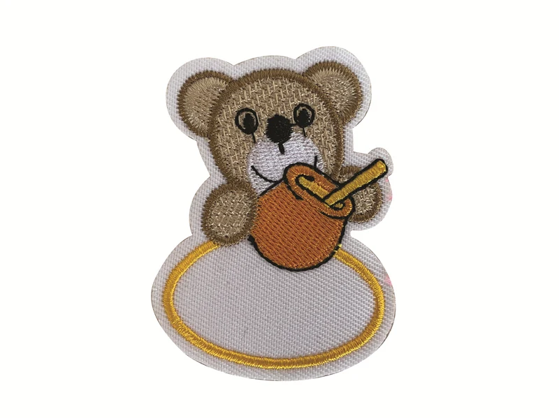 Small custom embroidered brown bear patch with detailed stitching and clean outline