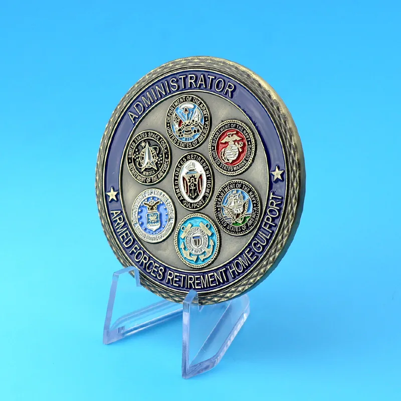 Set of three challenge coins in gold silver and bronze variants from the same die
