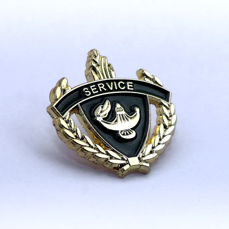 Back view of a custom 3D edge gold lapel pin with a pin back attachment and engraved reverse