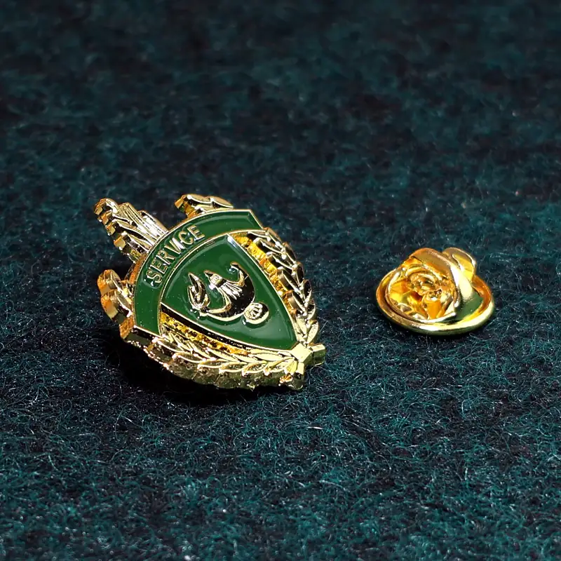 Side view of a custom 3D edge gold lapel pin highlighting the depth and dimension of the raised edges