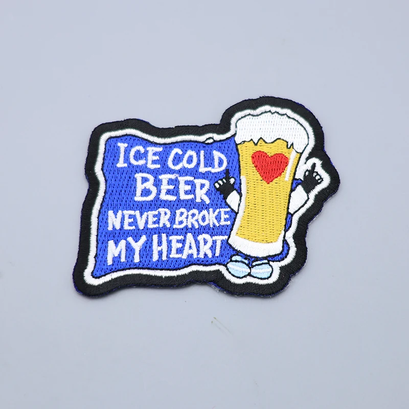Custom embroidered beer patch with red and black thread showing a beer mug silhouette and brewery name