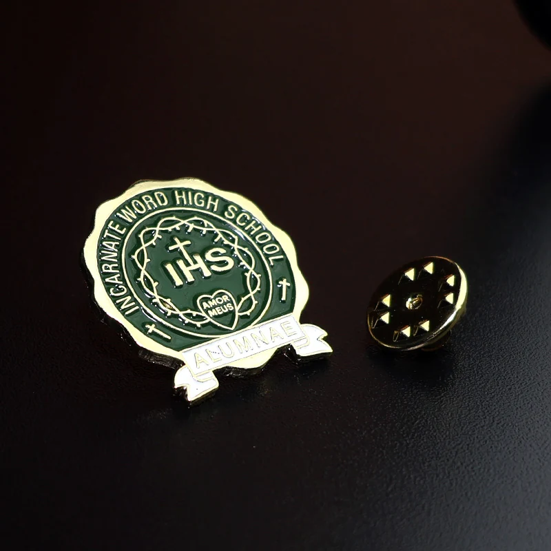 Close-up of the green enamel fill and raised metal edges on a custom lapel pin