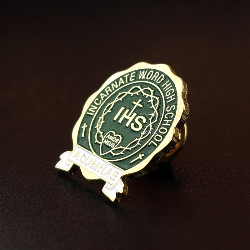 25mm green enamel lapel pin with a custom logo, showing the front face and safety pin back
